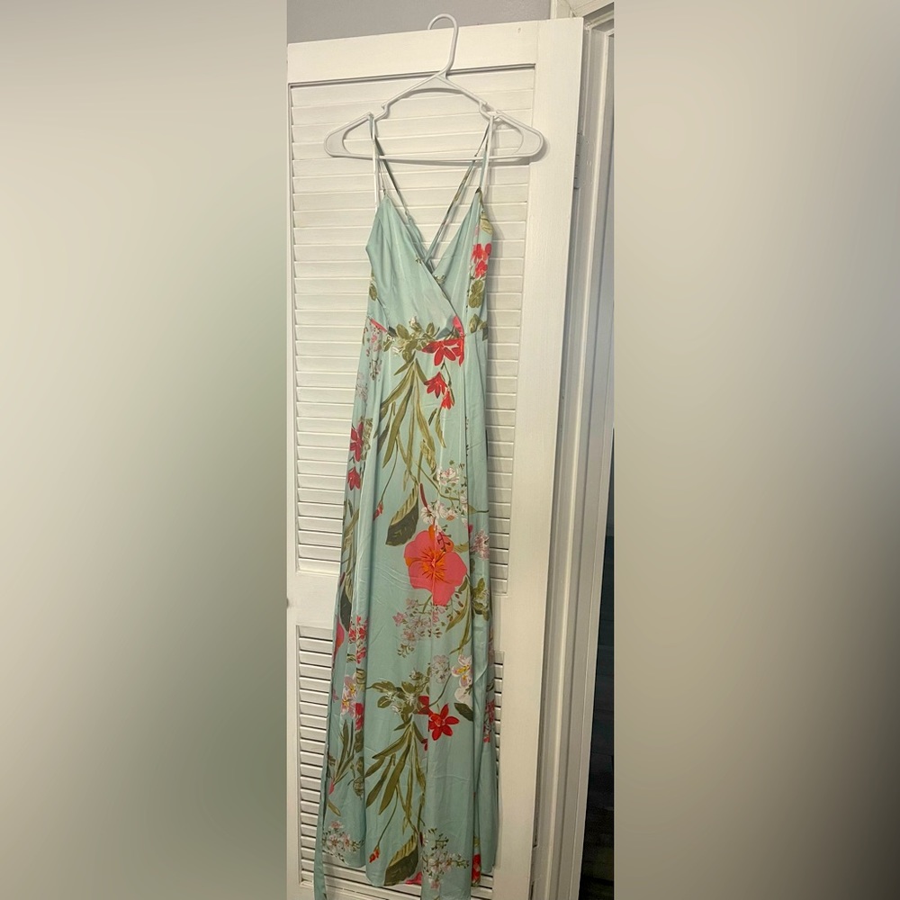 Brand new dress never worn. With original tag. Beautiful satin dress!